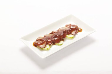 Doğu usulü domuz eti mi yoksa beyaz arka planda soslu Char Siew mi?.