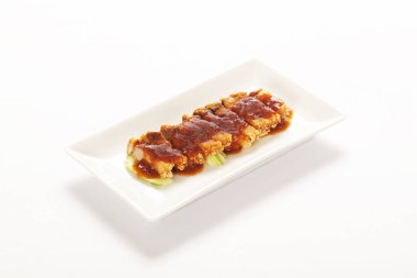 Doğu usulü domuz eti mi yoksa beyaz arka planda soslu Char Siew mi?.