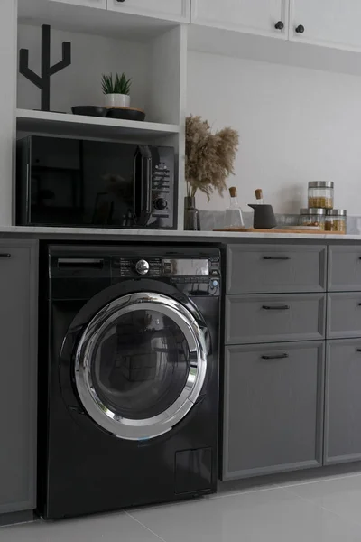 Close Black Washing Machine Installed Home Kitchen Counter — Stock Photo, Image