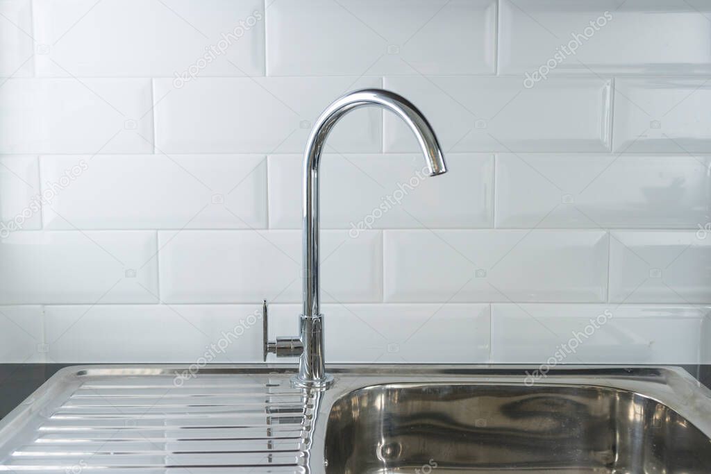 modern kitchen sink with water tap