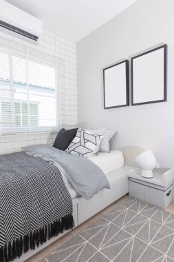 Yalnız ve şık bir adam için yatak odası. Grafik desenli gri iç mekânlı modern oda.