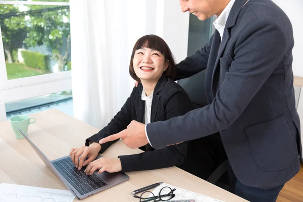 Asian Businessman Pointing Finger Computer While Woman Worker Working Typing — Stock Photo, Image