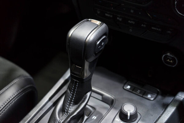 Close-up view of the automatic gearbox lever. Interior car, automatic transmission gearshift stick.