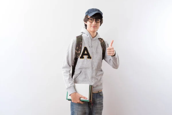 Bonito Adolescente Menino Estudantes Carregando Uma Mochila Livros Apontando Dedo — Fotografia de Stock