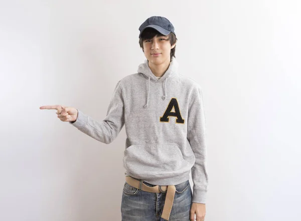 Handsome Teen Boy Students Wear Hoodie Cap Pointing Finger Standing — Stock Photo, Image