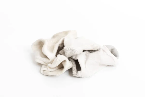 白い背景の上の汚れた靴下 — ストック写真