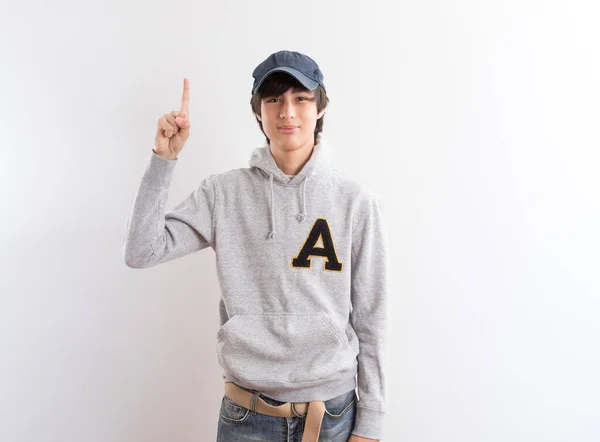 Handsome Teen Boy Students Wear Hoodie Cap Pointing Finger Standing — Stock Photo, Image