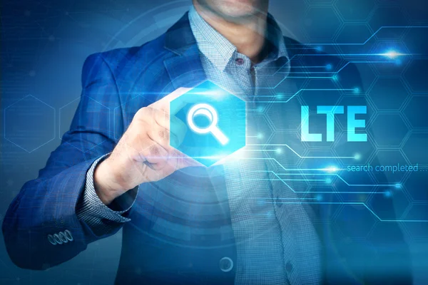 Business, internet, technology concept.Businessman chooses LTE b — Stock Photo, Image