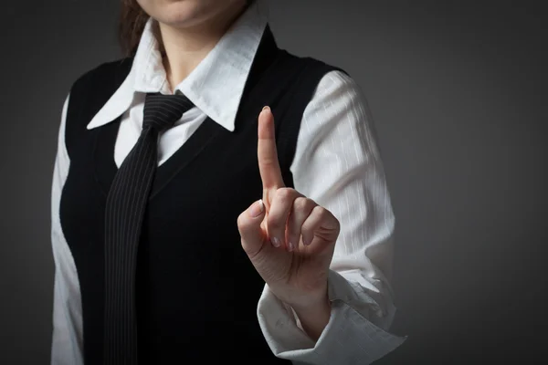 Mujer de negocios sobre un fondo gris — Foto de Stock