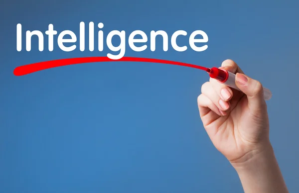 Hand writing Intelligence red marker on transparent wipe board.B — Stock Photo, Image