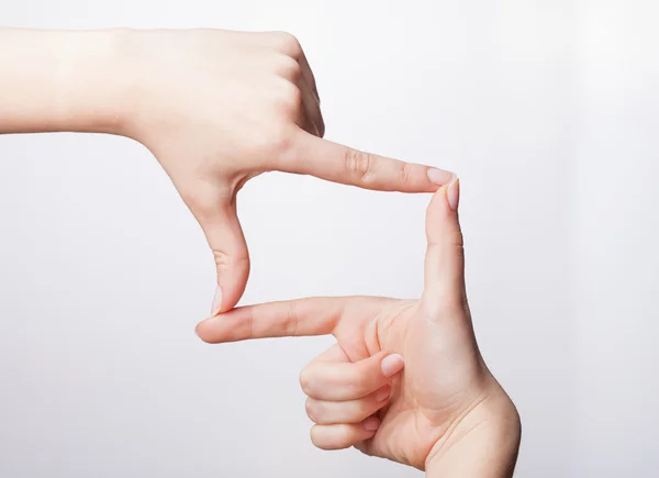 Frame made of hands on white background — Stock Photo, Image