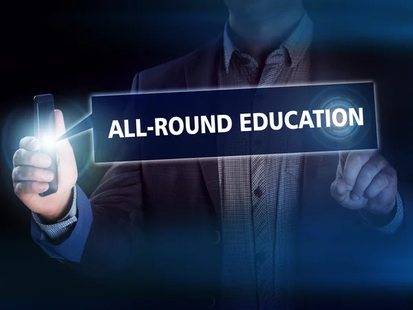 Businessman presses button all-round education on virtual screen — Stock Photo, Image