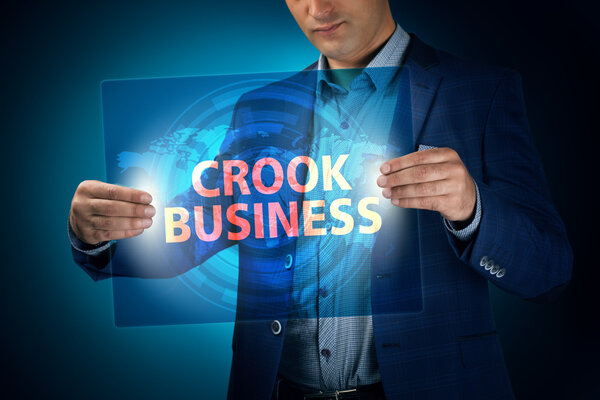 Businessman holding a transparent screen with an inscription a c