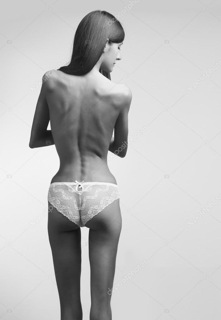 anorexic ass Part of woman body suffering anorexia nervosa — Stock Photo © putilich  #76932435