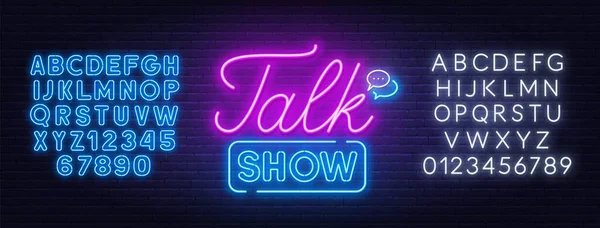 Tuğla duvar arka planında talk show neon tabelası.