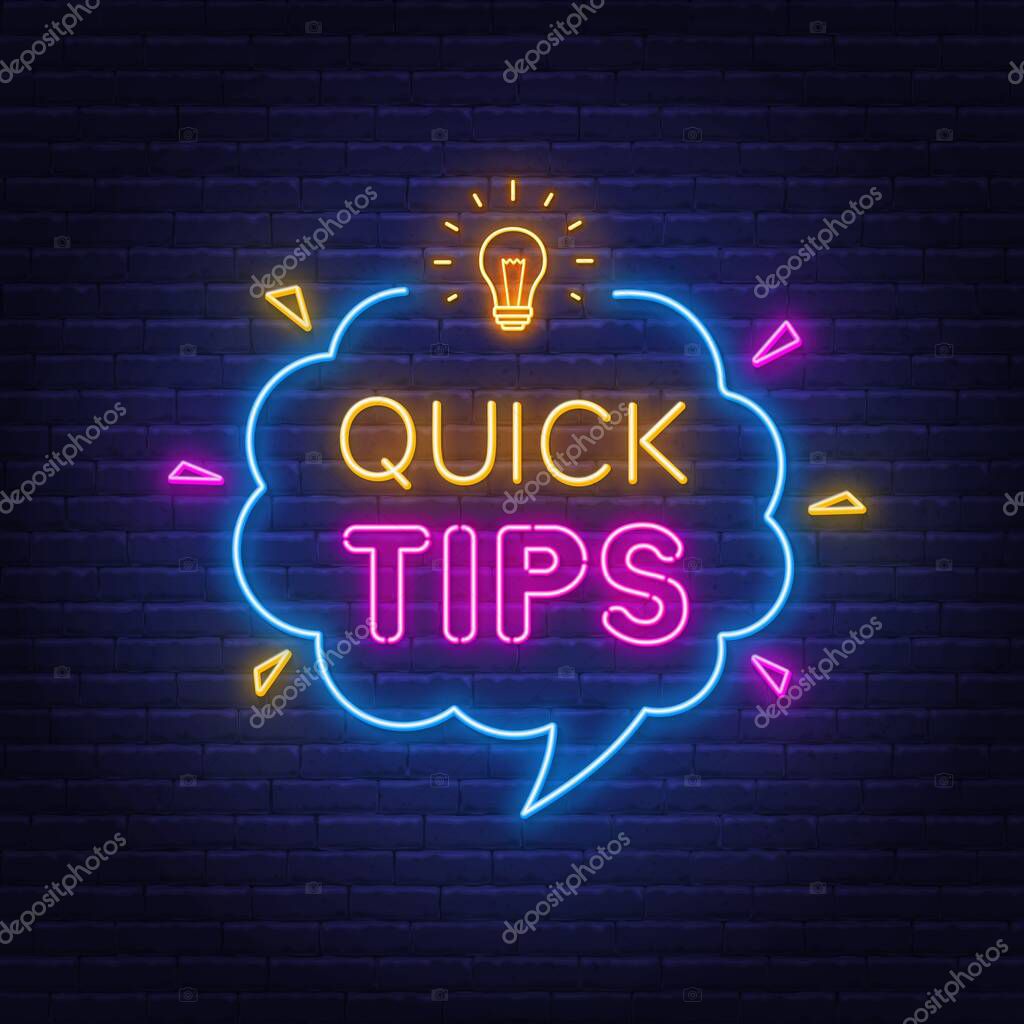 Quick Tips neon sign in the speech bubble on brick wall
