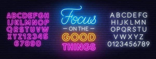Focus on the Good Things neon lettering on brick wall background. — Stock Vector