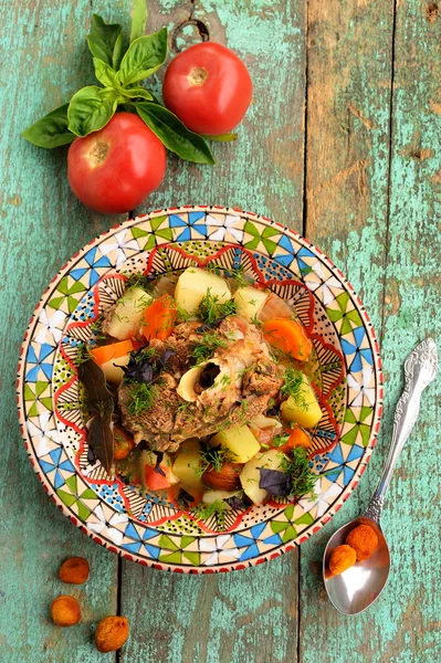 Homemade chorba soup with lamb meat on bone, potato, carrots — Stock Image Homemade chorba soup with lamb meat on bone, potato, carrots Stock Image