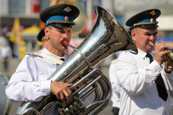 Orel, Russia - August 5, 2015: brass band musicians marching in