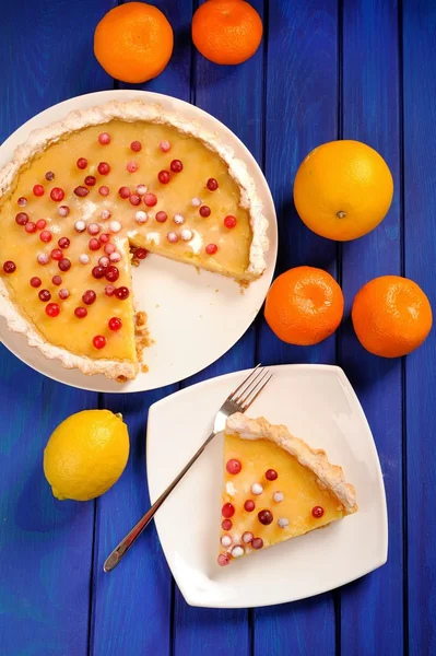 Lemon pie with condensed milk decorated with fresh cranberries a