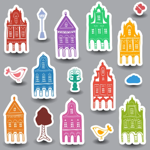 Casas garabatos sobre fondo de color — Vector de stock