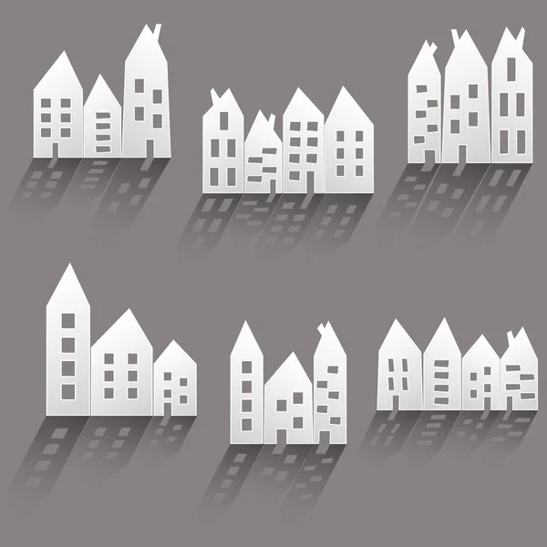 Paper houses with long shadow — Stock Vector