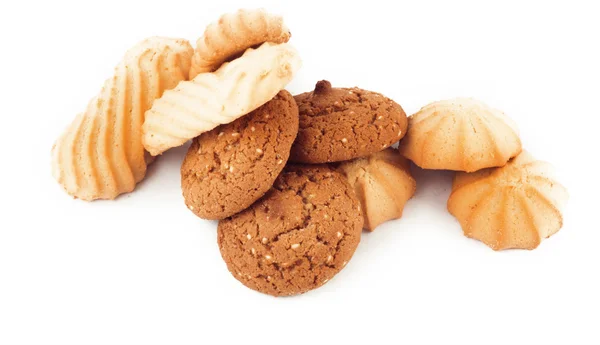 Galletas de pan corto y avena aisladas sobre fondo blanco — Foto de Stock