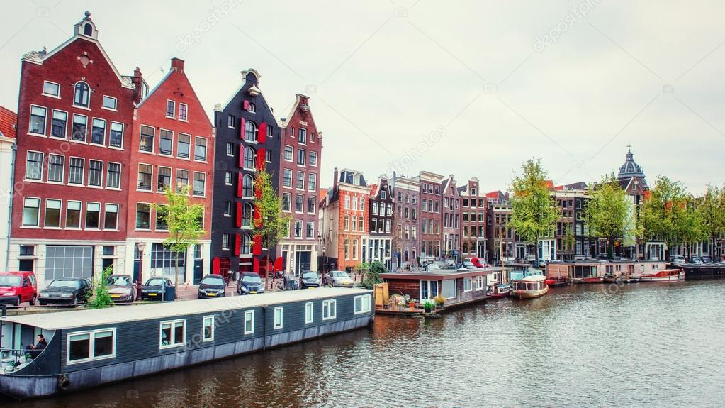 Amsterdam canal at sunset. Amsterdam is the capital.