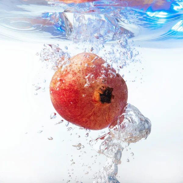 Garnet in the water on a white background — Stock Photo, Image