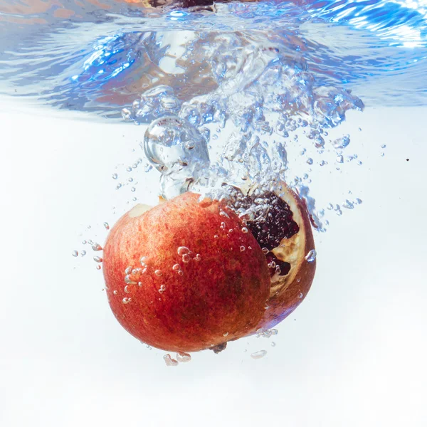 Garnet in the water on a white background — Stock Photo, Image