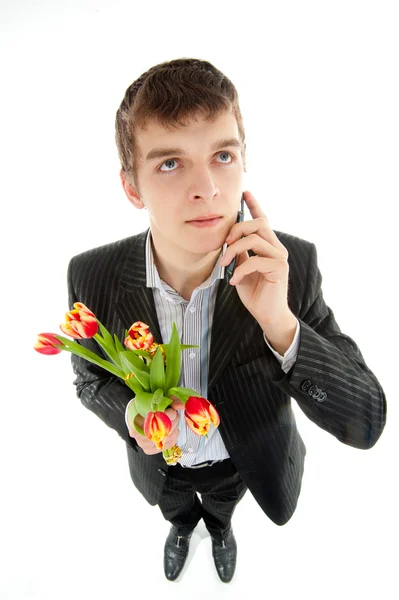 Empresário oferecendo tulipa — Fotografia de Stock