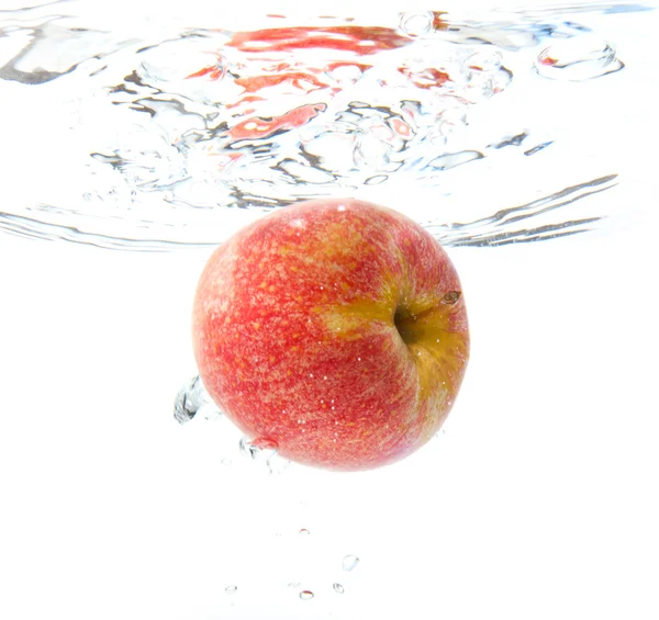 Apple in water — Stock Photo, Image