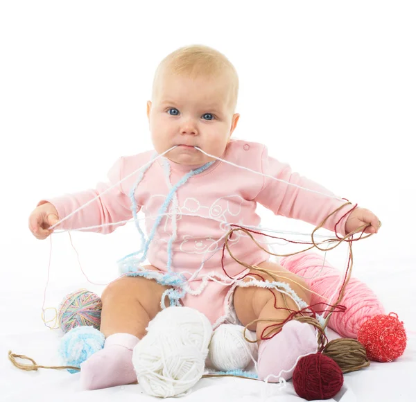 Girl with colored thread — Stock Photo, Image