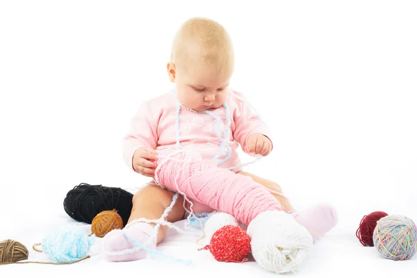 Girl with colored thread — Stock Photo, Image