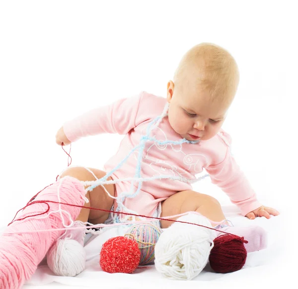 Girl with colored thread — Stock Photo, Image