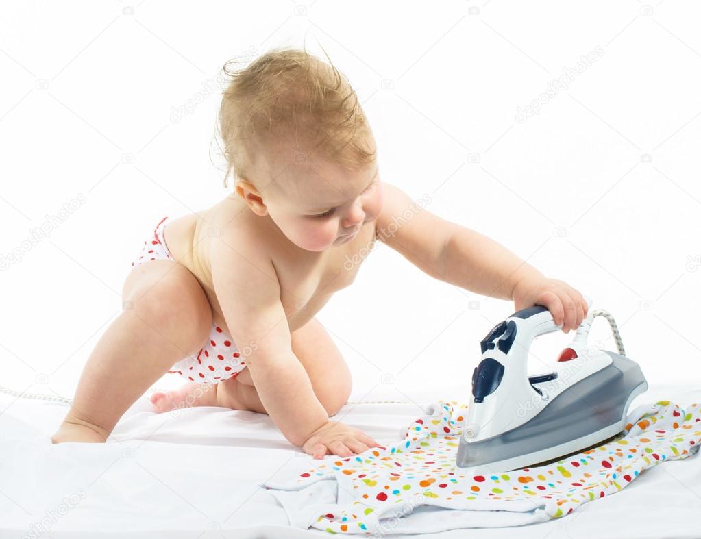 Little girl  ironing