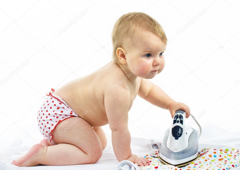 Little girl  ironing