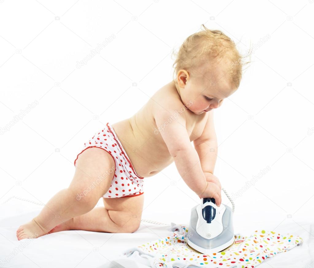 Little girl  ironing