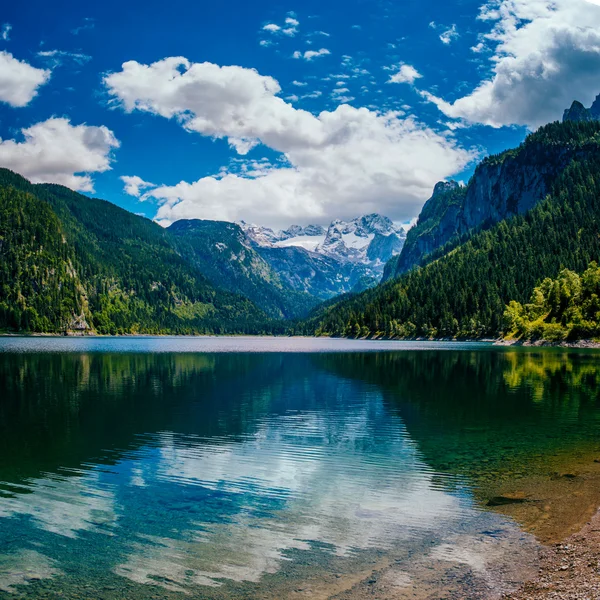 Mountain lake between by mountains — Stock Photo, Image