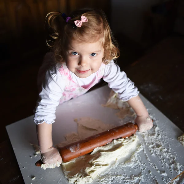 Photo of  baker adorable, pretty little caucasian girl in chef. — Stock Photo, Image