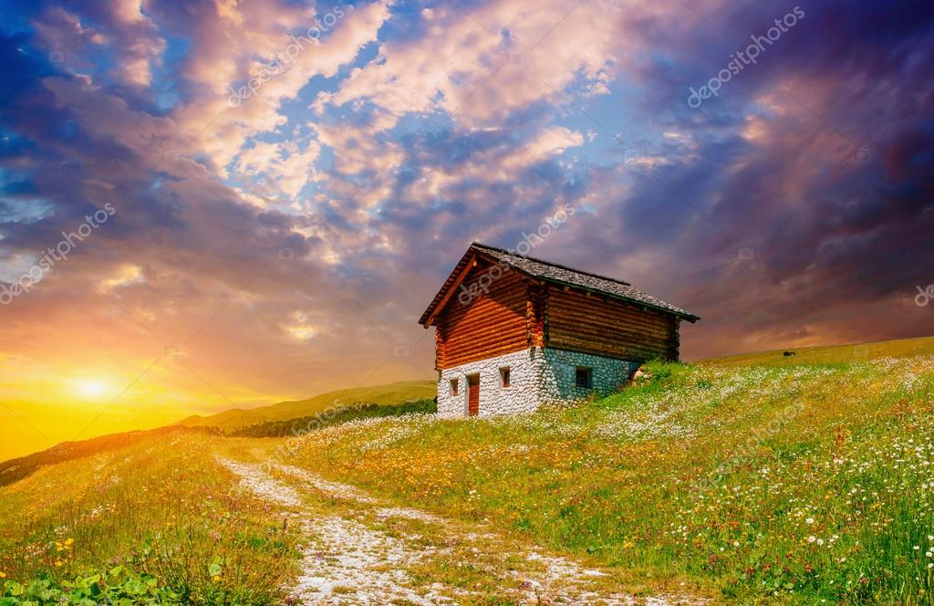 House in the mountains at sunset — Stock Photo © myronstandret 64696803