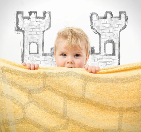 Adorable happy baby in yellow towel — Stock Photo, Image