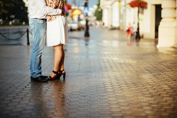 Reflected in a puddle couple outdoors road — Stock Photo, Image