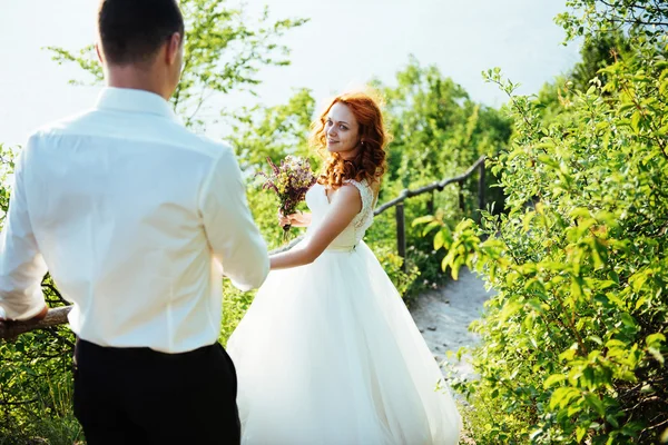 Happy couple bride on a summer day outdoors — Stock Photo, Image