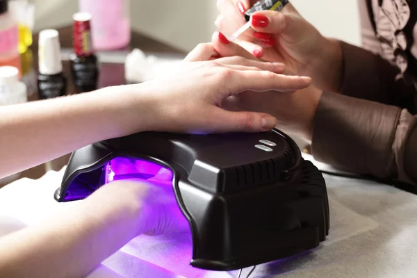 Nails care in modern beauty salon — Stock Photo, Image