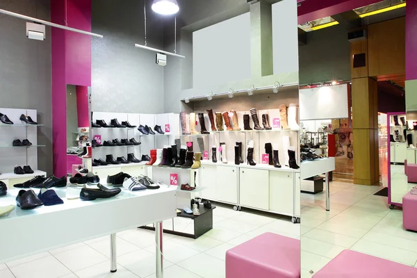 Interior of shoe store in modern european mall Stock Image