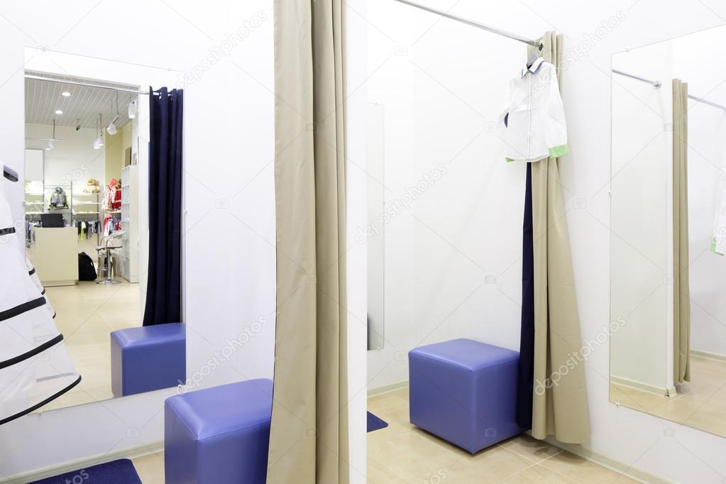 interior of dressing room at cloth store