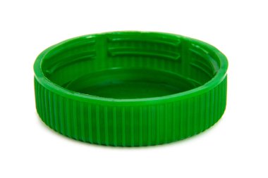 Yeşil plastik kapak beyaz üzerinde izole makro