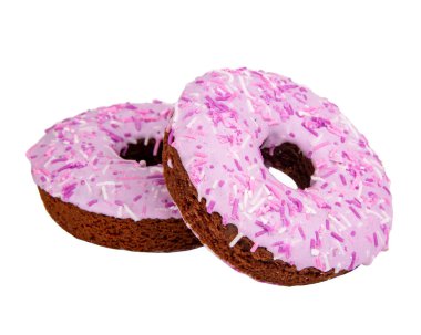 Beyaz arka planda izole edilmiş pembe menekşe kaplı donut.