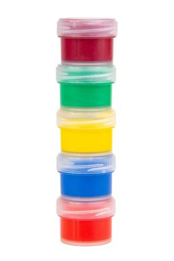 Different color cans of gouache paint isolated on the white background